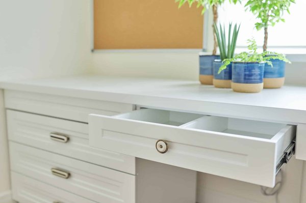 What are the best tips for creating a hidden home office in a UK living room alcove?